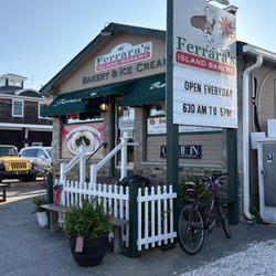 Ferrara's Italian Bakery - Outside of bakery - small seating on the side
