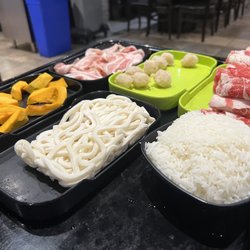 Little Szechuan Hot Pot - Japanese Pumpkin, udon noodles, rice, sirloin beef, chicken meatball and pork belly.