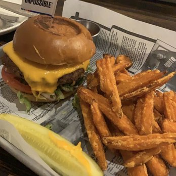 Uncommon Grill - American Burger with impossible burger substitute, cheddar cheese and sweet potato fries. - New American Near Me - Watertown, Connecticut Uncommon Grill - American Burger with impossible burger substitute, cheddar cheese and sweet potato fries. - New American Near Me - Watertown, Connecticut