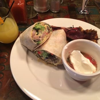 Julians - Herbed egg wrap with a side of bacon and a mimosa! - New American Near Me - Providence, Rhode Island Julians - Herbed egg wrap with a side of bacon and a mimosa! - New American Near Me - Providence, Rhode Island