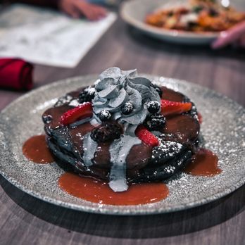 Basalt - Charcoal Pancake with strawberry guava sauce - New American Near Me - Honolulu, Hawaii