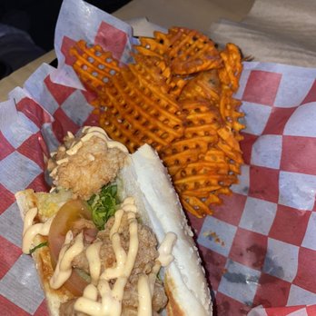 Surfing Crab - Shrimp poboy with sweet potato fries - Cajun/Creole Near Me - San Antonio, Texas Surfing Crab - Shrimp poboy with sweet potato fries - Cajun/Creole Near Me - San Antonio, Texas