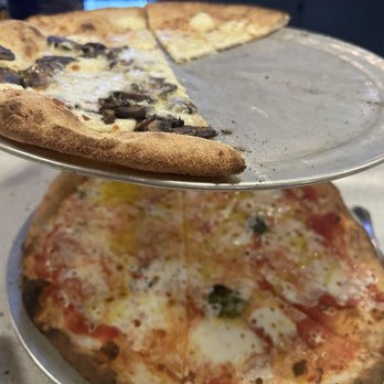 Nicky's Coal Fired - Big formaggio (top), Margherita (bottom) - Pizza Near Me - Nashville, Tennessee Nicky's Coal Fired - Big formaggio (top), Margherita (bottom) - Pizza Near Me - Nashville, Tennessee