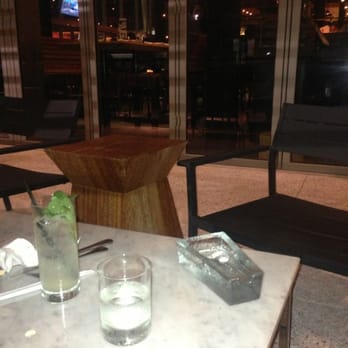 Earls Kitchen + Bar - Used Ashtray left on table from before we arrived throughout our meal. No soy sauce or chopsticks or service either! - New American Near Me - Miami, Florida