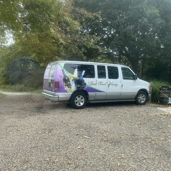 Spirit Knob Winery - a van parked in a parking lot - Wineries Near Me - Ursa, Illinois