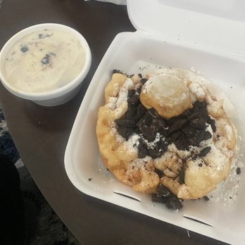 Sticky Icky Funnel Cakes - Funnel cake covered with oreo cookies, topped off with deep fried oreo cookie and a side of cookies and cream ice cream. - Juice Bars & Smoothies Near Me - Long Beach, California Sticky Icky Funnel Cakes - Funnel cake covered with oreo cookies, topped off with deep fried oreo cookie and a side of cookies and cream ice cream. - Juice Bars & Smoothies Near Me - Long Beach, California