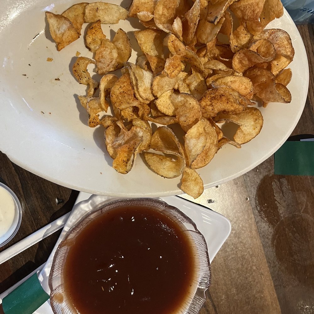 Ron's Roost - Saratoga chips and warm tangy bbq sauce - Burgers Near Me - Cincinnati, Ohio Ron's Roost - Saratoga chips and warm tangy bbq sauce - Burgers Near Me - Cincinnati, Ohio