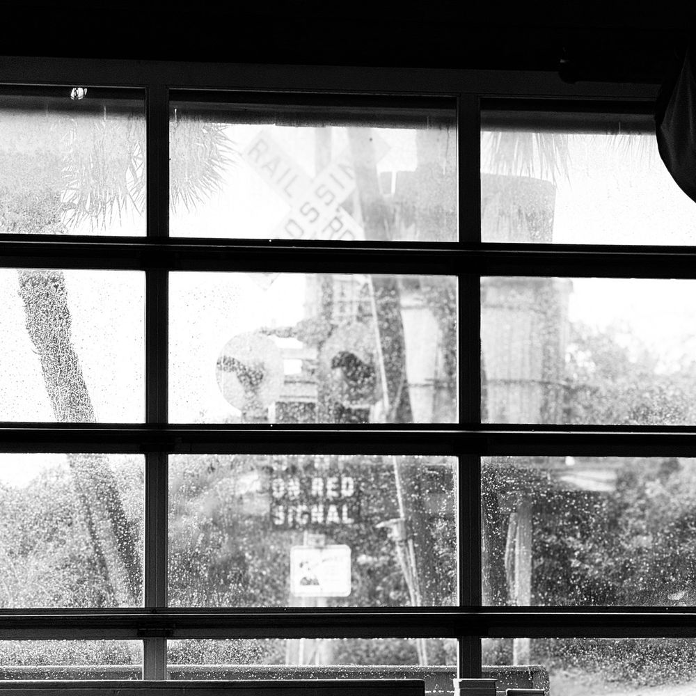 Flounder's Chowder House - Window views on a rainy day - Seafood Near Me - Gulf Breeze, Florida Flounder's Chowder House - Window views on a rainy day - Seafood Near Me - Gulf Breeze, Florida