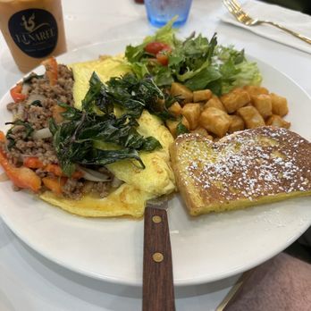 Kinaree Eatery - Holy Chili Bomb Basil Omelette (very flavorful, big portion with lots of chicken, tons of included sides) - Breakfast & Brunch Near Me - Irvine, California Kinaree Eatery - Holy Chili Bomb Basil Omelette (very flavorful, big portion with lots of chicken, tons of included sides) - Breakfast & Brunch Near Me - Irvine, California