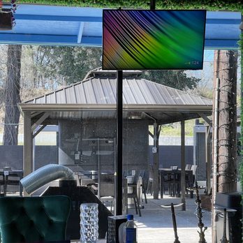 Texas Zeus Cafe - Covered patio outdoor seating. - Hookah Bars Near Me - Houston, Texas Texas Zeus Cafe - Covered patio outdoor seating. - Hookah Bars Near Me - Houston, Texas