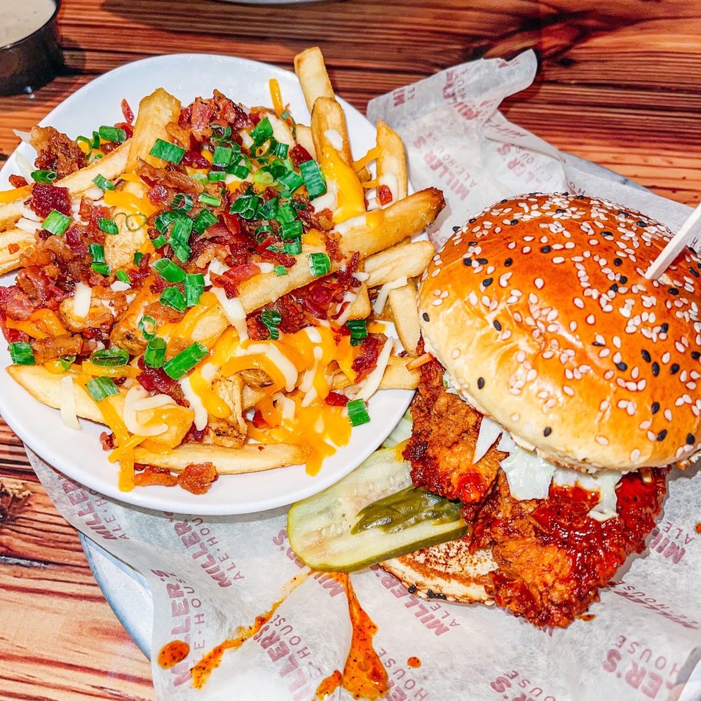 Miller's Ale House - Nashville chicken sandwich, loaded fries - Sports Bars Near Me - Ocala, Florida Miller's Ale House - Nashville chicken sandwich, loaded fries - Sports Bars Near Me - Ocala, Florida