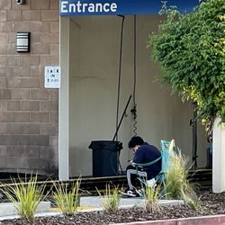 Chevron’s Express Wash - Chevron lazy carwash attendant