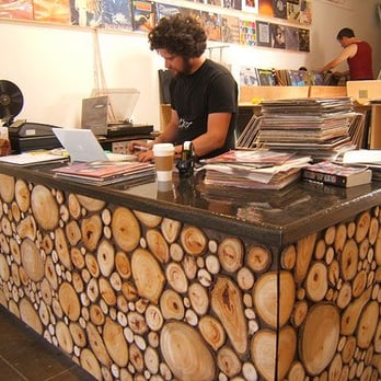 Warbler Records & Goods - The owners built the desk and vinyl shelving themselves. - Vinyl Records Near Me - Santa Barbara, California