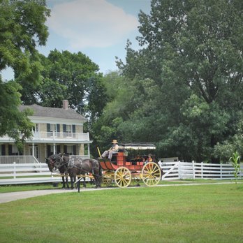 Mahaffie Stagecoach Stop & Farm - The mudwagon style stagecoach rests in front of the 1865 limestone Mahaffie home. - Museums Near Me - Olathe, Kansas Mahaffie Stagecoach Stop & Farm - The mudwagon style stagecoach rests in front of the 1865 limestone Mahaffie home. - Museums Near Me - Olathe, Kansas