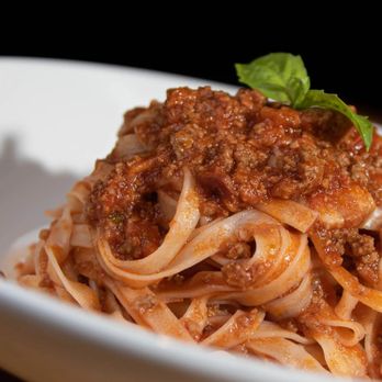 Apulia - a plate of spaghetti with meat and sauce - Pizza Near Me - Hoboken, New Jersey