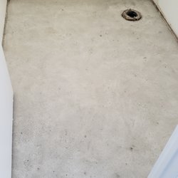 Fresh Air Environmental Services - Bathroom after Fresh Air removed tiles and black mastic.  Ready for flooring and paint.