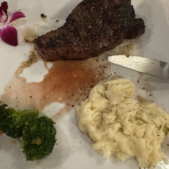 The Cellar - Ny strip and potatoes - Cocktail Bars Near Me - Sebring, Florida