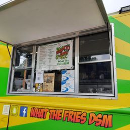 a yellow and green food truck a yellow and green food truck