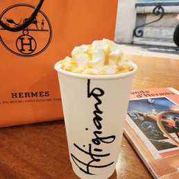 No pictures allowed inside the store so I took a picture of the Hermes paper bag with my coffee No pictures allowed inside the store so I took a picture of the Hermes paper bag with my coffee