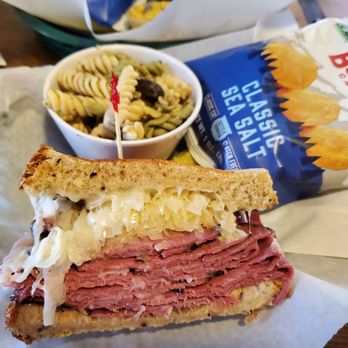 Ann O'Malley's - 1 of 2 basket of shared whole pastrami reuben and pasta salad - Irish Pub Near Me - St. Augustine, Florida