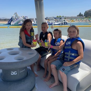 Adventure Lagoon - Kids enjoying shave ice in one of the floating cabanas. - Water Parks Near Me - Anaheim, California Adventure Lagoon - Kids enjoying shave ice in one of the floating cabanas. - Water Parks Near Me - Anaheim, California