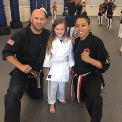 Art Beins Karate - Master Carl Beams awarding Mia her white belt! ABK FREEHOLD