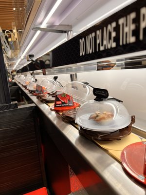 Kura Revolving Sushi Bar by null