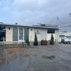 Bay Area Endodontics - Parking located to the left of the building, spots marked RED BAY AREA ENDODONTICS