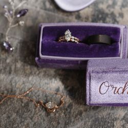 Mitchell's Jewelers - My custom made necklace with my mom's diamond from her wedding ring. Also my engagement ring with band