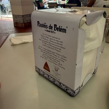 Pastéis de Belém - Photo 4: Their story on the napkin dispenser - Bakeries Near Me - Lisbon, 11 Pastéis de Belém - Photo 4: Their story on the napkin dispenser - Bakeries Near Me - Lisbon, 11