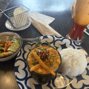 Thai Station Restaurant - Panang Curry lunch special with Thai tea and complimentary salad in ginger peanut dressing + shirimp chips in a mini metal basket. - Thai Near Me - Carrboro, North Carolina Thai Station Restaurant - Panang Curry lunch special with Thai tea and complimentary salad in ginger peanut dressing + shirimp chips in a mini metal basket. - Thai Near Me - Carrboro, North Carolina
