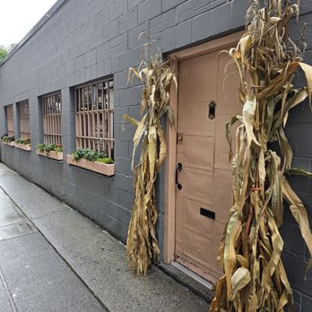 The Pink Door - Is it pink? Or peach? Either way, this is the door you are looking for. This is the way. - Italian Near Me - Seattle, Washington The Pink Door - Is it pink? Or peach? Either way, this is the door you are looking for. This is the way. - Italian Near Me - Seattle, Washington