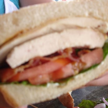Seaside Shanty Restaurant - a person holding a sandwich - Seafood Near Me - Chester, Nova Scotia Seaside Shanty Restaurant - a person holding a sandwich - Seafood Near Me - Chester, Nova Scotia