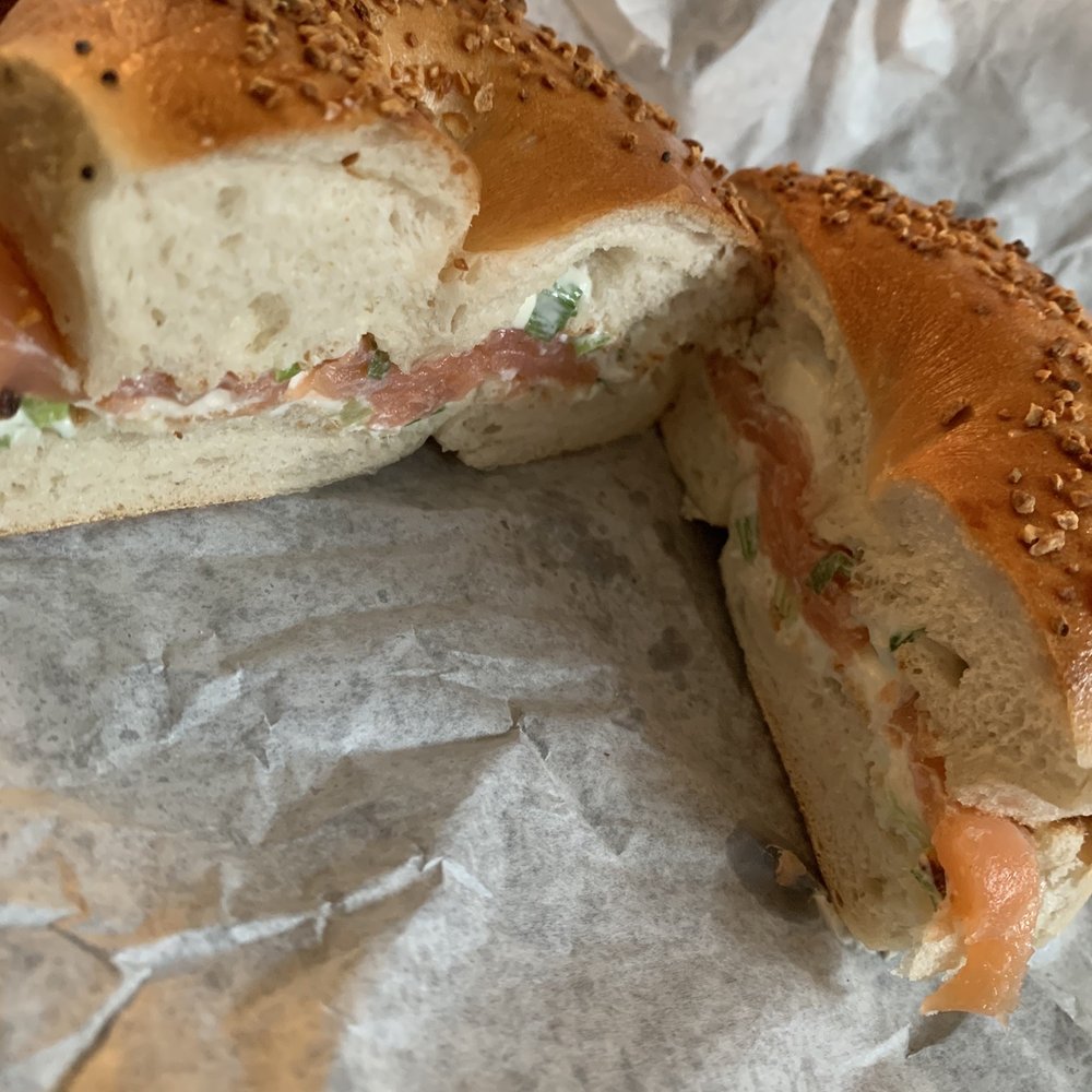 Iris Bagel and Coffee House - Garlic bagel with chive cream cheese and lox - Bagels Near Me - Arlington, Texas