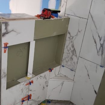 FLORES FLOORING - a picture of a bathroom being remodeled - Tiling Near Me
