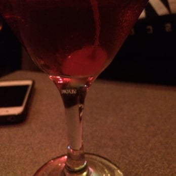 Green Room - a glass of wine on a table - Dive Bars Near Me - Toronto, Ontario