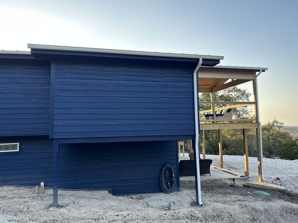 Slide of Gonzalez Seamless Rain Gutters