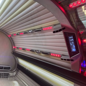 Sun Tan City - Looking down the bed and the internal controls for the ventilation, sound, & facial tanning. - Tanning Near Me - Louisville, Kentucky Sun Tan City - Looking down the bed and the internal controls for the ventilation, sound, & facial tanning. - Tanning Near Me - Louisville, Kentucky