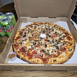 Venice Pizza - This is the XL 16" Meat Lovers, hold the Salami add Extra Black Olives and a 4 pack of Dew. Solid watchin the Steelers Browns snow game.