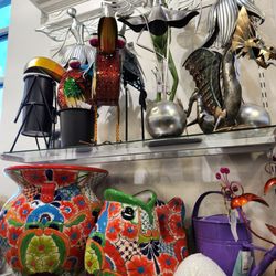 HomeGoods - Decorative ceramic pots, yard sculpture and more