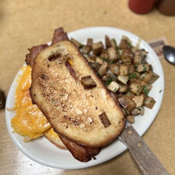 Gravy - a plate of food on a table - American Near Me - Portland, Oregon Gravy - a plate of food on a table - American Near Me - Portland, Oregon