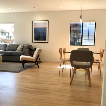 Conin Floors - a living room and dining area - Flooring Near Me Conin Floors - a living room and dining area - Flooring Near Me