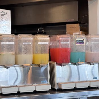 Hummus Republic - Flavored lemonade behind the counter. - Mediterranean Near Me - Fresno, California Hummus Republic - Flavored lemonade behind the counter. - Mediterranean Near Me - Fresno, California