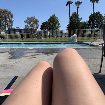 Golden Shore RV Resort  - Relaxing by the heated pool! - Campgrounds Near Me - Long Beach, California
