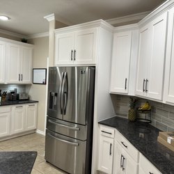 The Carpenter's Hand - Beautiful cabinet over the refrigerator!
