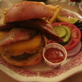 The Hitching Post 2 - oak grilled burger with cured bacon and avocado and fries - Steakhouses Near Me - Buellton, California The Hitching Post 2 - oak grilled burger with cured bacon and avocado and fries - Steakhouses Near Me - Buellton, California
