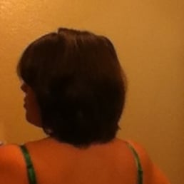 My new hair cut after I washed and straightened it. Very happy!!!
