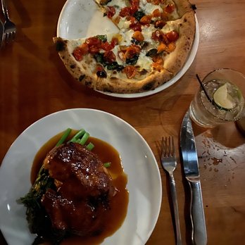 Louie - Pomodoro Fresca. Roast Chicken and jus on a bed of Rapini. - Italian Near Me - Clayton, Missouri Louie - Pomodoro Fresca. Roast Chicken and jus on a bed of Rapini. - Italian Near Me - Clayton, Missouri