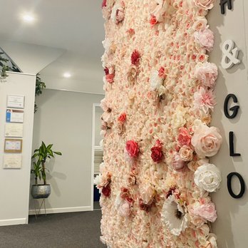 Blush & Glo - Check out our beautiful "selfie" flower wall!!! - Tanning Near Me