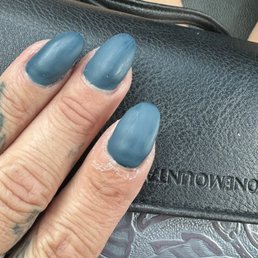 Looks like someone molded a nail out of clay.